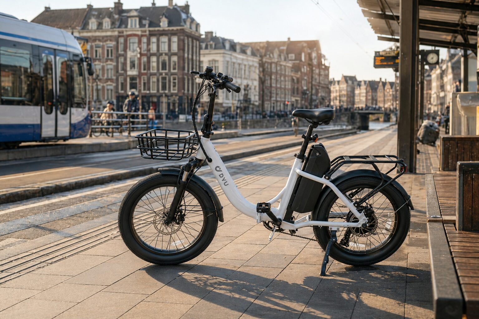 DYU C9 folding electric bike at a European tram stop before a long commute
