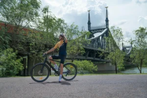 DYU Stroll 1 rider standing on a bridge for a city puncture prevention guide cover